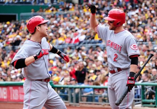 Reds rout Pirates 11-3, tie for wild card lead
