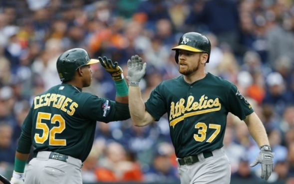 A's top Tigers 6-3 for 2-1 AL division series lead