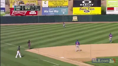 Cubs outfielder Darnell McDonald trips over his own feet, does not catch fly ball (GIF)