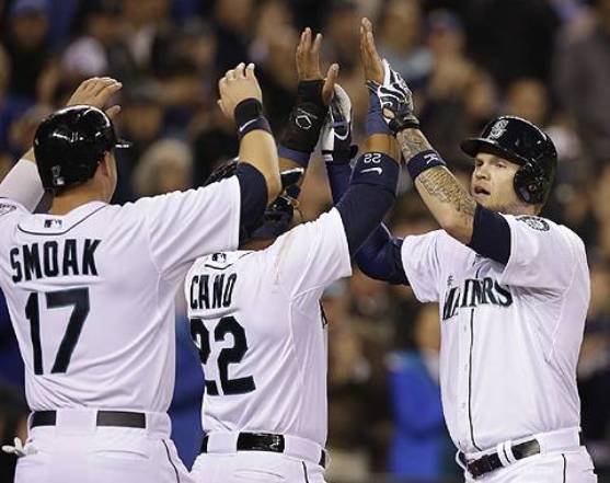 Hart homers twice as Mariners win home opener over Angels