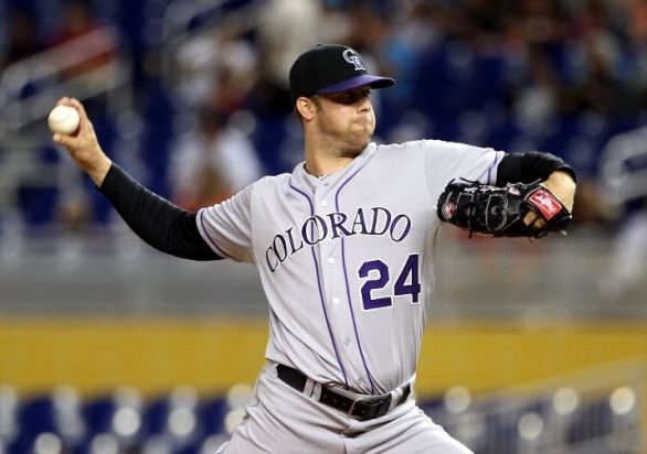Rockies hold off Marlins after three-run first