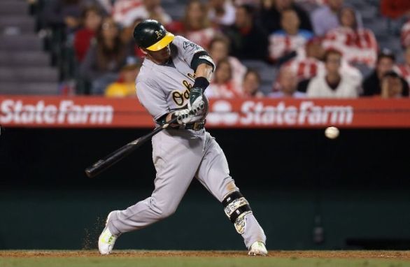 Donaldson, A's rally in 11th to beat Angels again