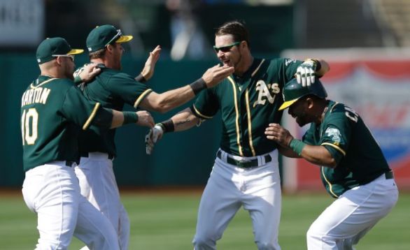 A's score 3 in 9th, rally past Astros 4-3