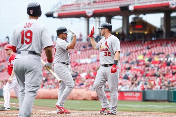 Cardinals beat Reds 7-6 after 3 hour, 42 minute rain delay