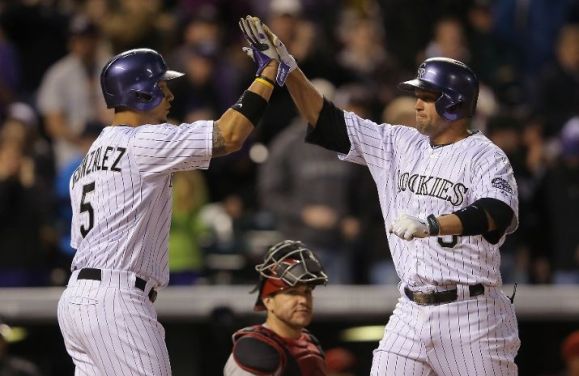 Rockies ride three homers to 9-4 win over D-backs