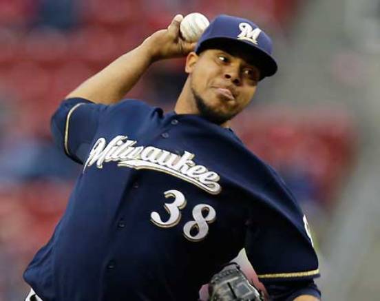 Peralta doubles home 2 runs, Brewers beat Reds 2-0