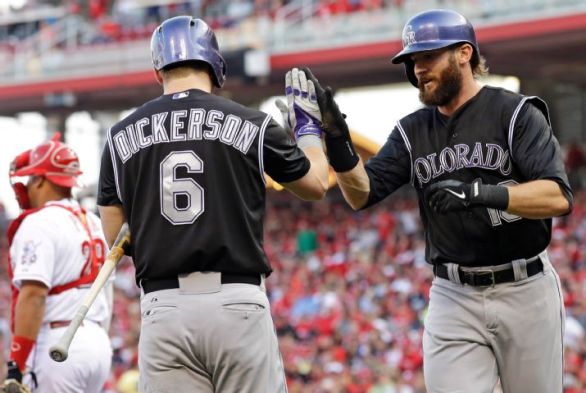 Rockies rack up five homers in 11-2 rout of Reds