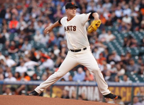 Giants rally to give Cain 1st win