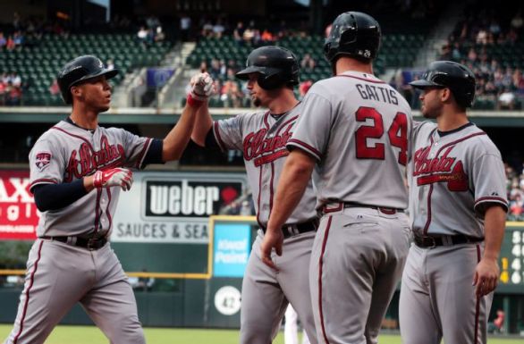 Braves hit 3 home runs in 13-10 win over Rockies