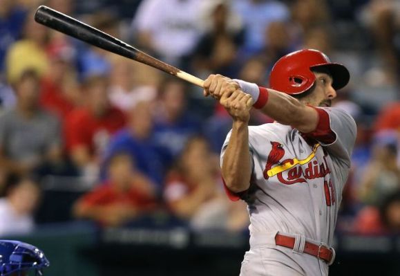 Cardinals bounce back, beat Royals 5-2 in 11