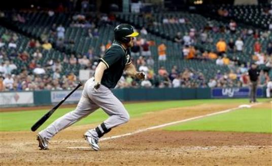 Athletics rally for 6 runs in 9th, beat Astros 7-4 