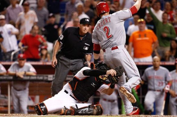 Reds capitalize after call to sink Marlins