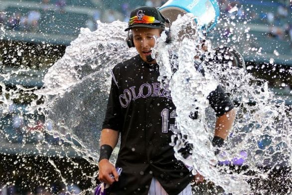Rockies rally for 10-9 victory over Reds