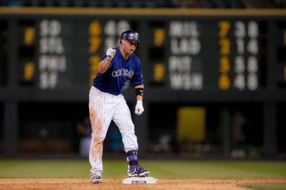 Rockies rally in 8th to complete DH sweep of Reds