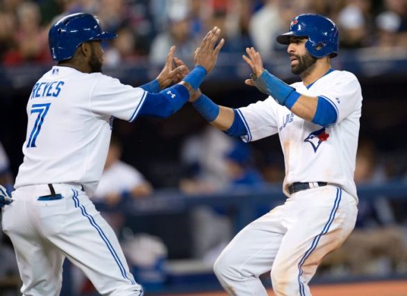 Bautista homers, Jays rout Mariners 14-4