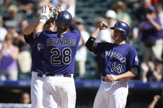 Four homers boost Rockies over Giants 9-2
