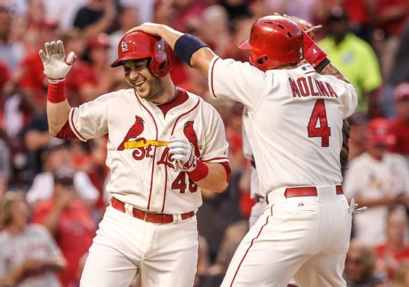 Cardinals hit three home runs to top Reds, move closer to playoffs