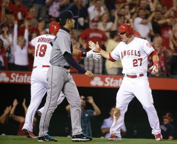 Angels clinch playoff spot, beat Mariners 8-1
