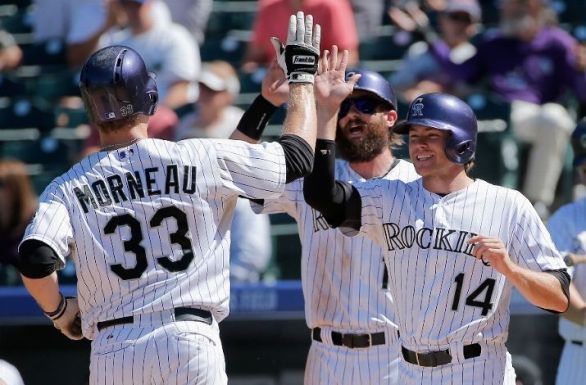 Rockies pound out 16 runs on 21 hits, cruise past Dodgers