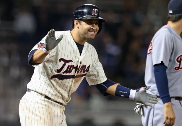 Twins topple Tigers to tighten Central race