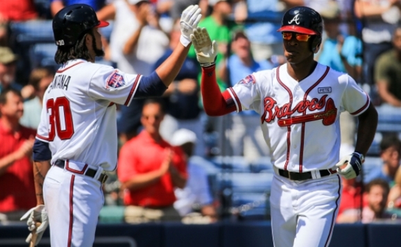 Braves break out with 7-4 win over Phillies 