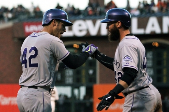 First-place Rockies complete sweep of struggling Giants