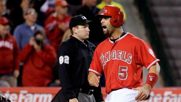 Cron leads Angels' rally past Texas to 3rd straight win, 4-1