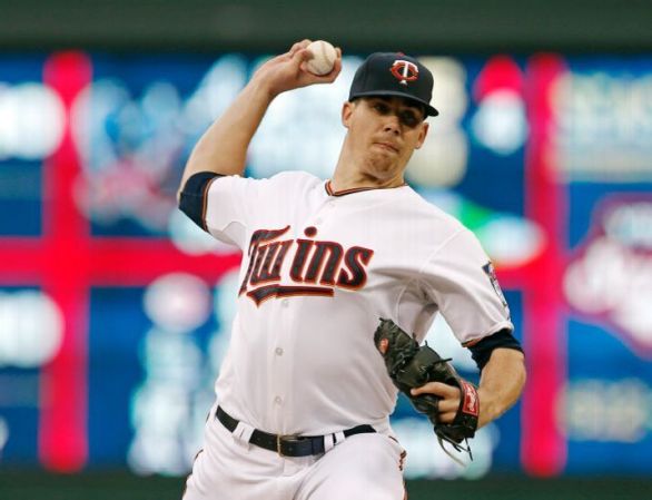 May tosses gem as Twins heat up on Indians