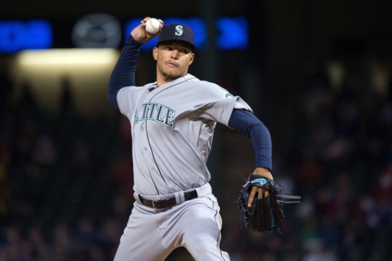 Walker has solid start for Mariners in 3-1 win at Rangers