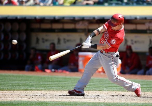 Calhoun leads Angels to 6-5 win over A's