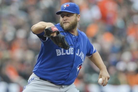 Buehrle, Bautista lead Blue Jays to 12-5 rout of Orioles