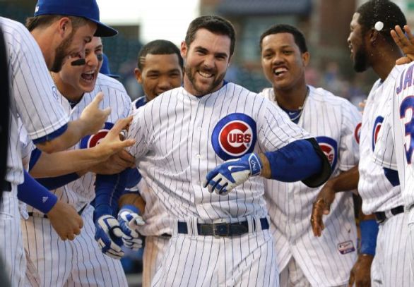 Cubs win in 12th when Pirates outfielder trips on easy fly