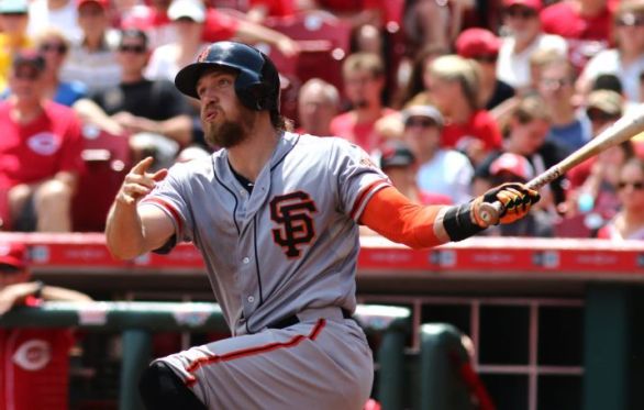Belt, Pence power Giants past Reds 9-8