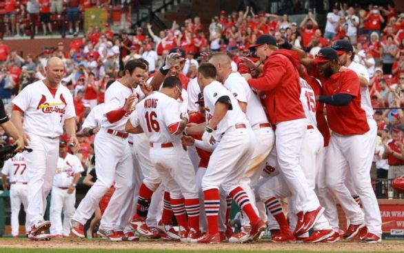 Cardinals win in extras again, beat Pirates 3-2 in 14