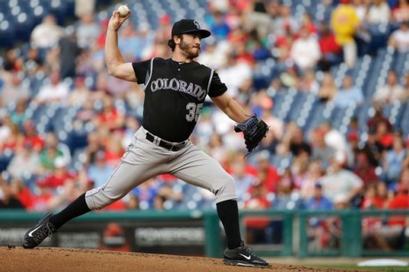 Bettis loses No-No in 8th, but Rockies beat Phillies 4-1