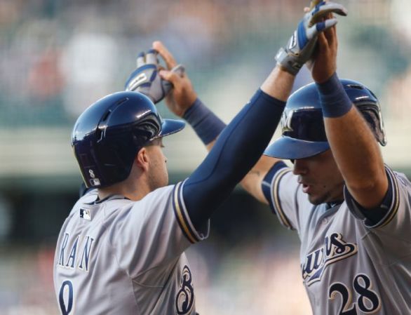 Brewers snap 6-game skid with 9-5 win over scuffling Rockies
