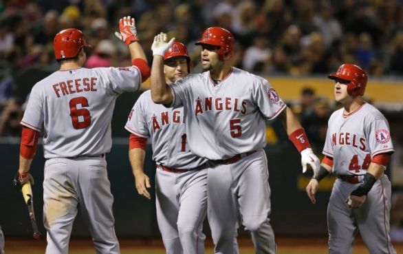 Pujols drives in 5 runs to rally Angels past Athletics, 12-7