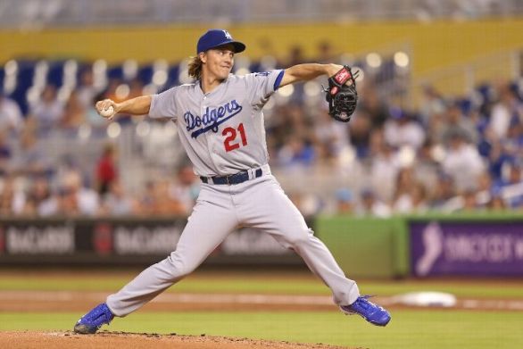 Greinke pitches into 8th inning, Dodgers blank Marlins