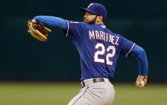 Moreland homers, Martinez pitches Rangers past A's 2-1