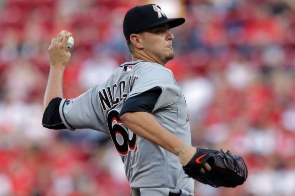 Nicolino sparkles in debut as Marlins beat Reds 5-0