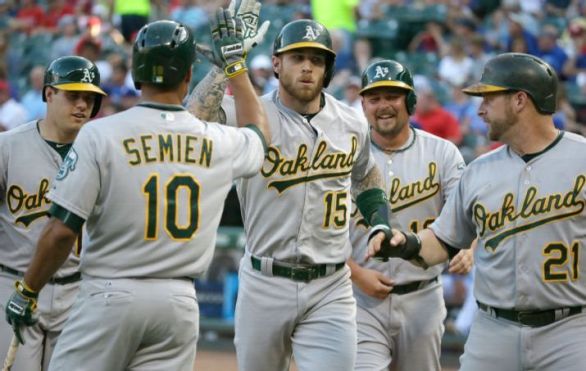 Lawrie, A's power past Rangers 8-2 for 4th straight victory