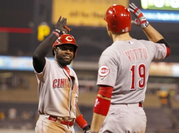 Reds outlast Pirates 5-4 in 13 innings on Phillips' homer