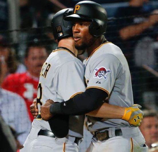 Walker, Marte hit homers as hot Pirates top Braves 10-8