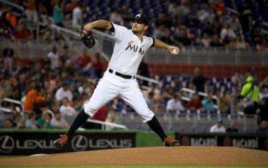 Brad Hand pitches Marlins past Cubs 5-2