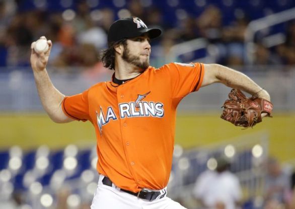 Haren escapes repeated jams to help Marlins beat Reds 8-1