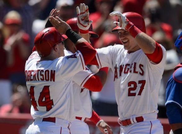 Trout has grand slam, solo HR in Angels' win over Rangers