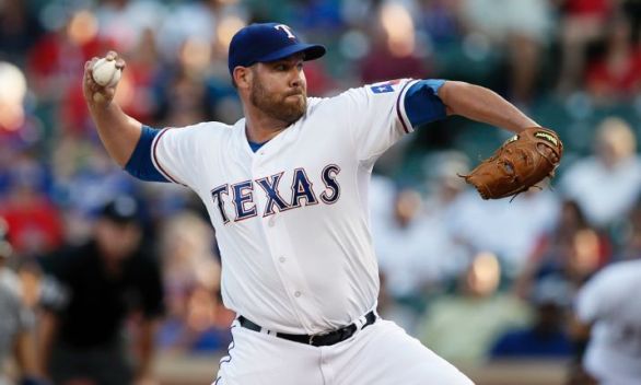 Rangers re-sign Colby Lewis to one-year contract