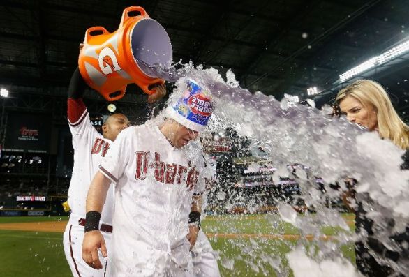Pennington's sac fly in 10th wins it for D-backs, 4-3