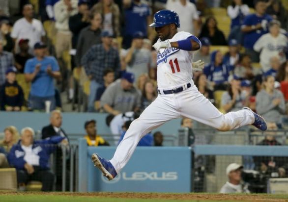 Jimmy Rollins rallies Dodgers past his former Phillies team
