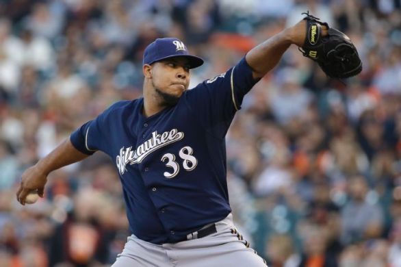 Peralta returns for Brewers and shuts down Giants